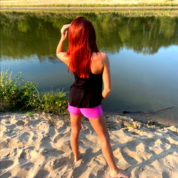 Stylish Red Hair Model by the Lake