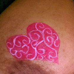 Vivid Heart Tattoo on Arm