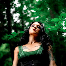 OnlyFans Model Adeline Sky in Forest Setting, Tattoo