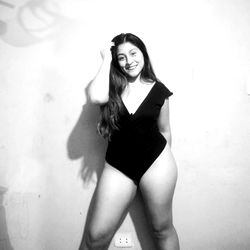 Model Alexia in Stylish Black One-Piece Swimsuit