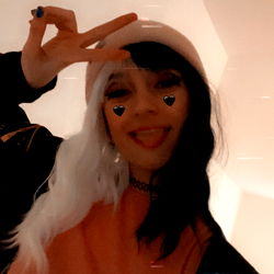 Amethyst Rose in a Pose with the Peace Sign