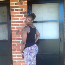 Stylish Model Delisha Newsome Posing in Front of Brick House