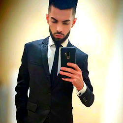 Fashionable Groom in Black Tuxedo