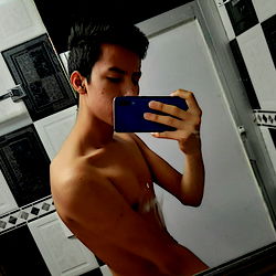 Shirtless Selfie with a Phone