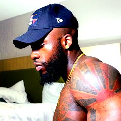 Model Mont Stands Confidently in His Bedroom