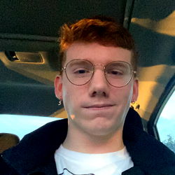 Noah from Atlanta Georgia, Wearing Glasses and T-shirt with His Smile 🌞☕️