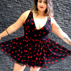 Stylish Woman in a Red Polka Dot Mini Dress