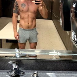 Fitness Model Tj in Gym Mirror