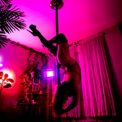 Dance Pole Performer in a Home Studio