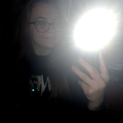 Amelia Rose, a young woman with glasses, captured in Texas