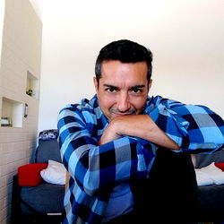 Alejandro, a man posing confidently