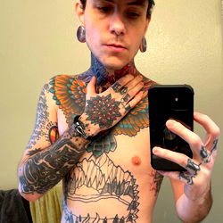 Spencer Maloney's Tattoo-Covered Abs Showcased in a Striking Black and White Photo