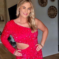 Female Model AllieNextDoor Poses in Stylish Red Outfit for OnlyFans Promotion