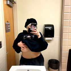 Andromeda Darlow in the Bathroom Mirror