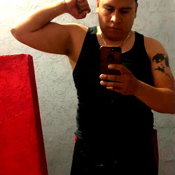 Augusto, Bodybuilder in Black Tank Top with Fists Up