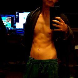 RVT's Shirtless Post with Gaming Setup in Background