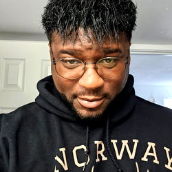 Stylish Man in Eye Glasses with a Shaved Head