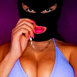 Diablita X, a striking OnlyFans model from Spain, showcasing her bold and confident persona. 