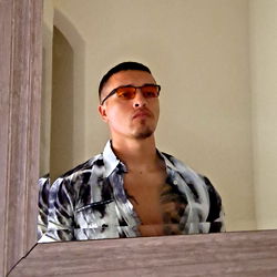 A Model's Confident Expression in Mirror Reflection