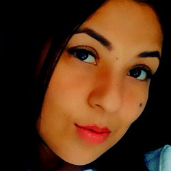 Elegant and Confident Model La Aleja in a White T-shirt