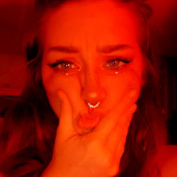 Red-haired woman making a funny face