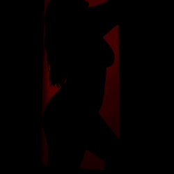 Kayla, a Model Silhouetted in Dark