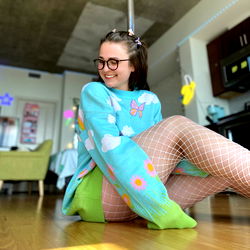 Model Kayla, a Playful Character in a Colorful Outfit