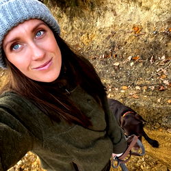 Outdoor Enthusiast Adventuring with Her Dog