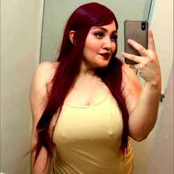 A Woman Posing in Her Bathroom