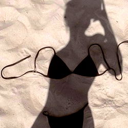 Fashionable Model Silhouette on Beach