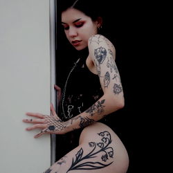 Acromatiq: Striking Tattooed Model