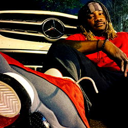 Ace Boogie, Sitting in a Car with Red Shoes