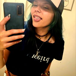 An OnlyFans Model Taking a Selfie