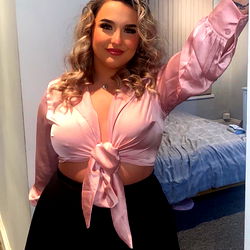 Fashionable OnlyFans Model Posing for the Camera