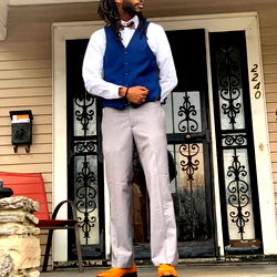 Model DrewJones posing confidently on porch steps