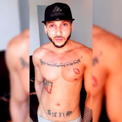 Fit and Tattooed Model Posing in Underwear