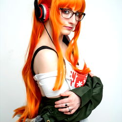Stylish Anime-Inspired Cosplay with Red Hair and Glasses
