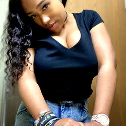 Detroit-based OnlyFans model Layla showcasing her confident pose for the camera