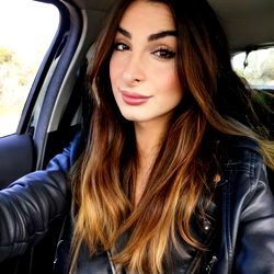 Stylish Andrea Posing in Car