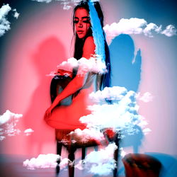 Stylized, artistic OnlyFans model photo with a dreamy aesthetic and cosmic elements