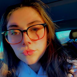 Woman in Glasses, Seated