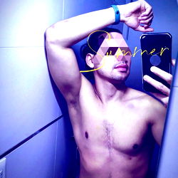 J_Roots, A Model Posing in a Bathroom Mirror