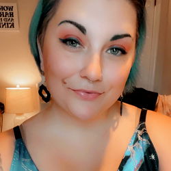 Stylish Woman with Colorful Hair and Tattoo