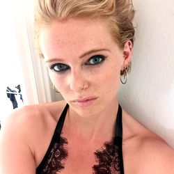 Lauren Cash, a London based OnlyFans model, strikes an intense pose for a portrait session in the city.