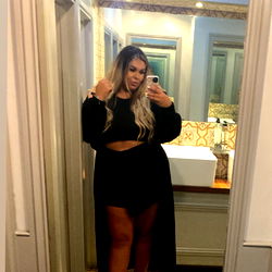 OnlyFans Model KINKYGIGI Posing for Photo