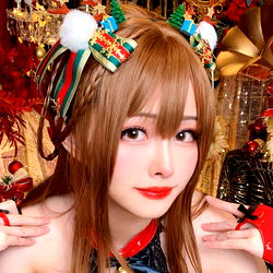 Fashionable Taiwanese Model Arty Huang Striking a Pose in an Enthusiastic Christmas Setting