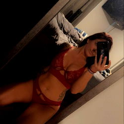 Tori, OnlyFans Model Posing in Red Lingerie