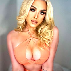 Transgender Model in Orange Bikini