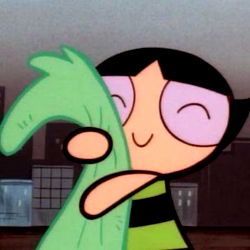 Z is affectionately holding a stuffed animal, showing love and care for her pet.