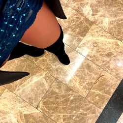 Stylish Model Walking on Marble Floor in the Lobby